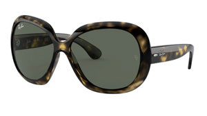 "Oversized Ray-Ban sunglasses with tortoiseshell frame and large lenses."