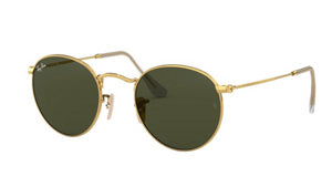 "Gold round Ray-Ban sunglasses with dark green lenses."